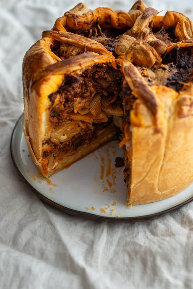 Timpana aus Kitchen Impossible auf hellem Untergrund.